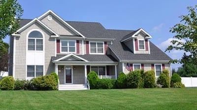 newly installed roof on a grey home
